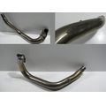 Auspuff-Krmmerrohr fr den vorderen Zylinder<br>Zustand: Gebraucht mit Mangel<br><br>Verwendbar fr: Yamaha BT 1100 Bulldog, Typ: RP05, Modelljahr: von 01/2002 bis 12/2006