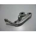 Bremspedal-Halter<br>Zustand: Gebraucht ohne Mngel<br><br>Verwendbar fr: Aprilia RSV 1000 Tuono R, Typ: RR, Modelljahr: von 01/2006 bis 12/2010