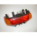 Rcklicht- und Blinker-Einheit (mit Kabel)<br>Zustand: Gebraucht ohne Mngel<br><br>Verwendbar fr: Kymco Spacer 125, Typ: SH25, Modelljahr: von 01/1997 bis 12/2000