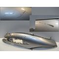 Sitzbankverkleidung rechts, silbern<br>Zustand: Gebraucht mit Mangel<br><br>Verwendbar fr: Piaggio Beverly 125, Typ: M28, Modelljahr: von 01/2001 bis 12/2003